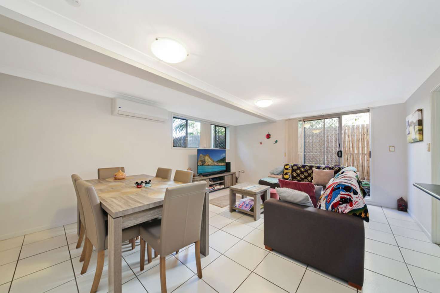 Main view of Homely townhouse listing, 1/65 Peach Street, Greenslopes QLD 4120