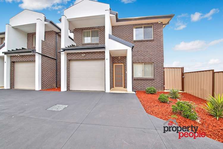 Main view of Homely townhouse listing, 4/16 Groundsel Avenue, Macquarie Fields NSW 2564