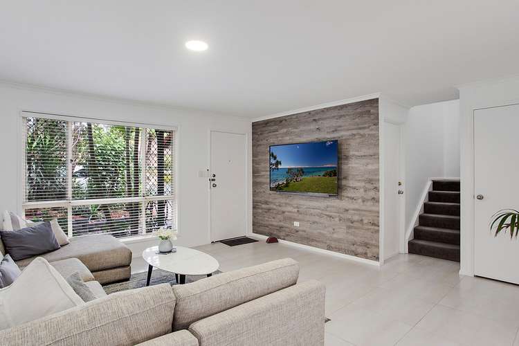 Main view of Homely townhouse listing, 11/18 Bottlewood Court, Burleigh Waters QLD 4220