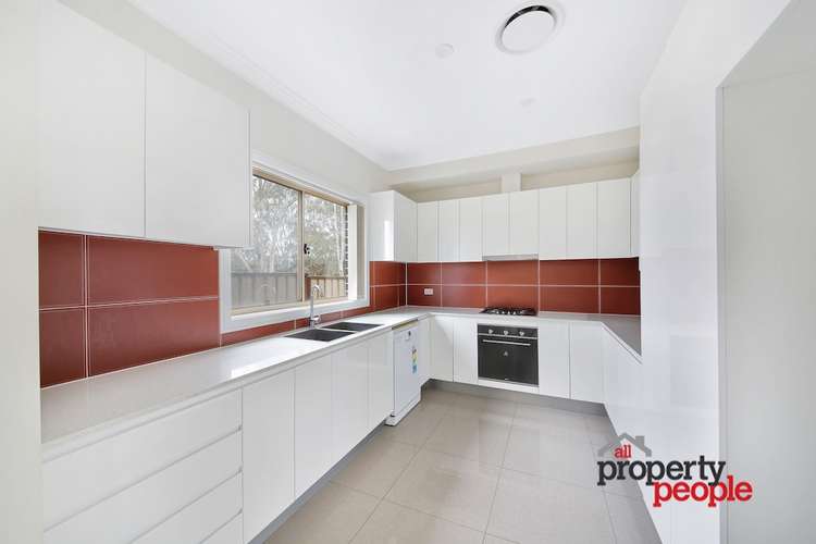 Second view of Homely townhouse listing, 2/16 Groundsel Avenue, Macquarie Fields NSW 2564