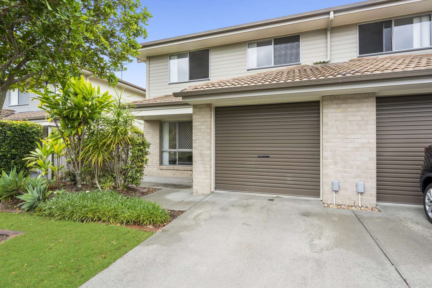 Main view of Homely townhouse listing, 28/30 Carmarthen Circuit, Pacific Pines QLD 4211