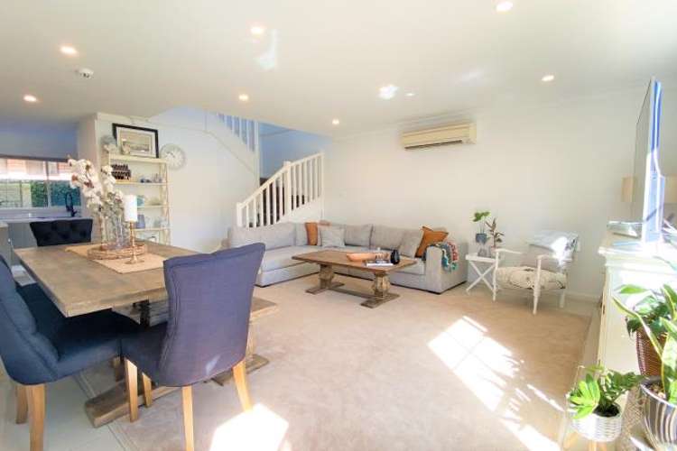 Main view of Homely townhouse listing, 1/12 KITSON PL, Minto NSW 2566