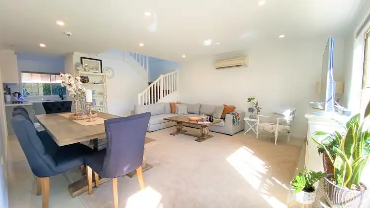 Main view of Homely townhouse listing, 1/12 KITSON PL, Minto NSW 2566