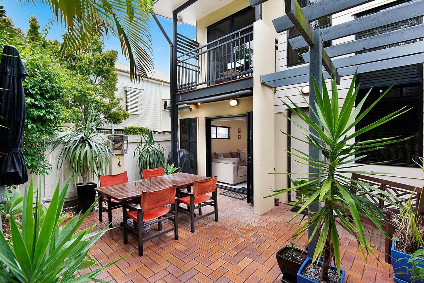 Main view of Homely townhouse listing, 1/17 Real Street, Annerley QLD 4103
