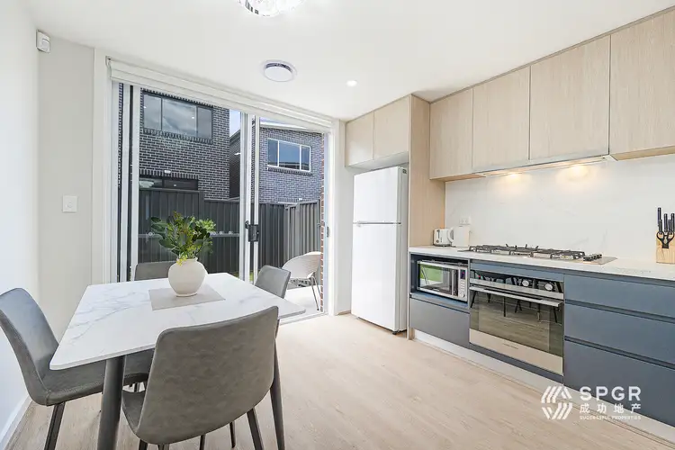 Third view of Homely townhouse listing, 12 Ashwini Glade, Box Hill NSW 2765