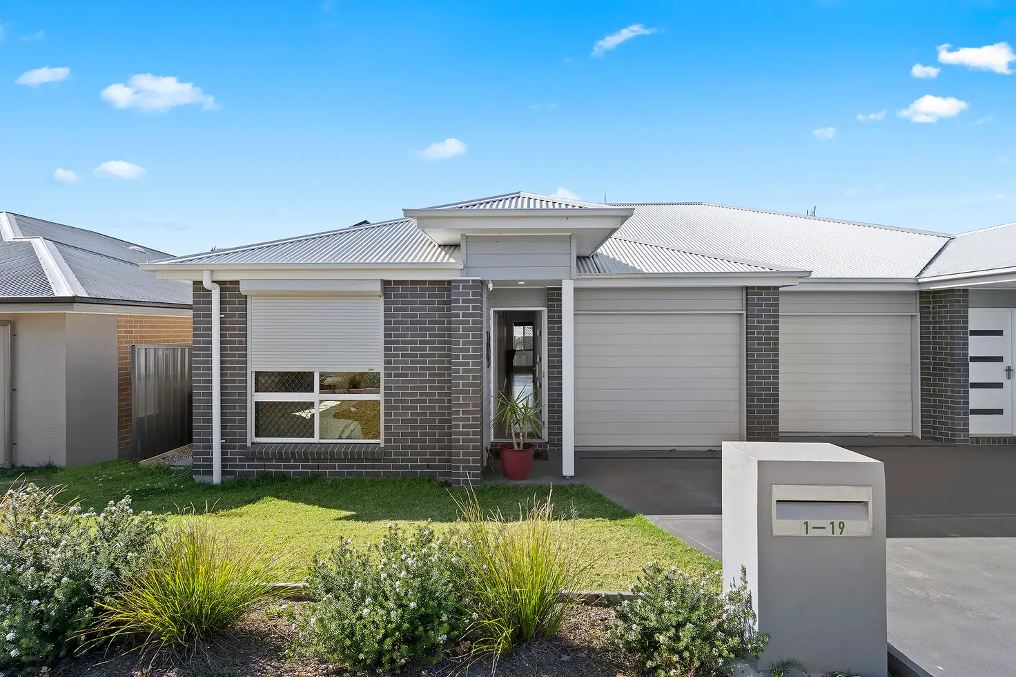 Main view of Homely semi-detached listing, 1/19 Aspen Drive, Gillieston Heights NSW 2321