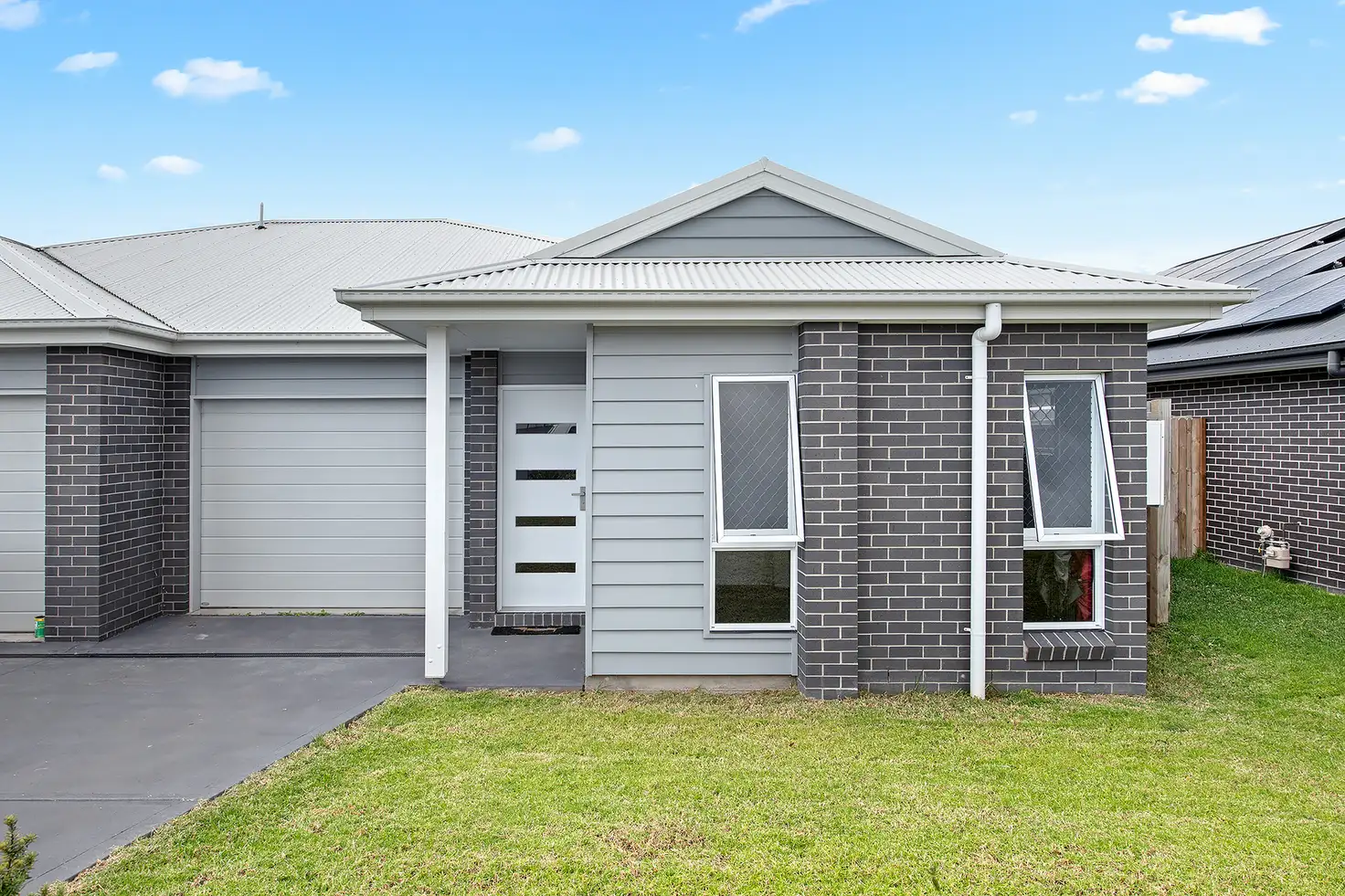 Main view of Homely semi-detached listing, 2/19 Aspen Drive, Gillieston Heights NSW 2321
