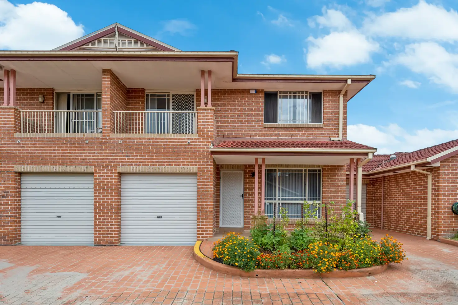 Main view of Homely townhouse listing, 3/10-12 Peacock Close, Green Valley NSW 2168