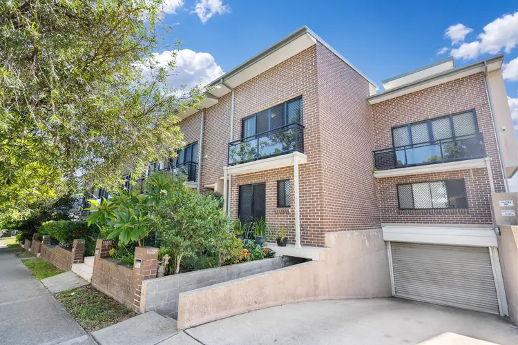 Main view of Homely townhouse listing, 9/11-13 Raglan Road, Auburn NSW 2144