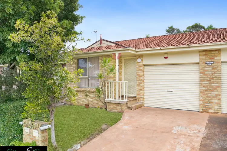 Main view of Homely villa listing, 2/4 Baragoot Road, Flinders NSW 2529