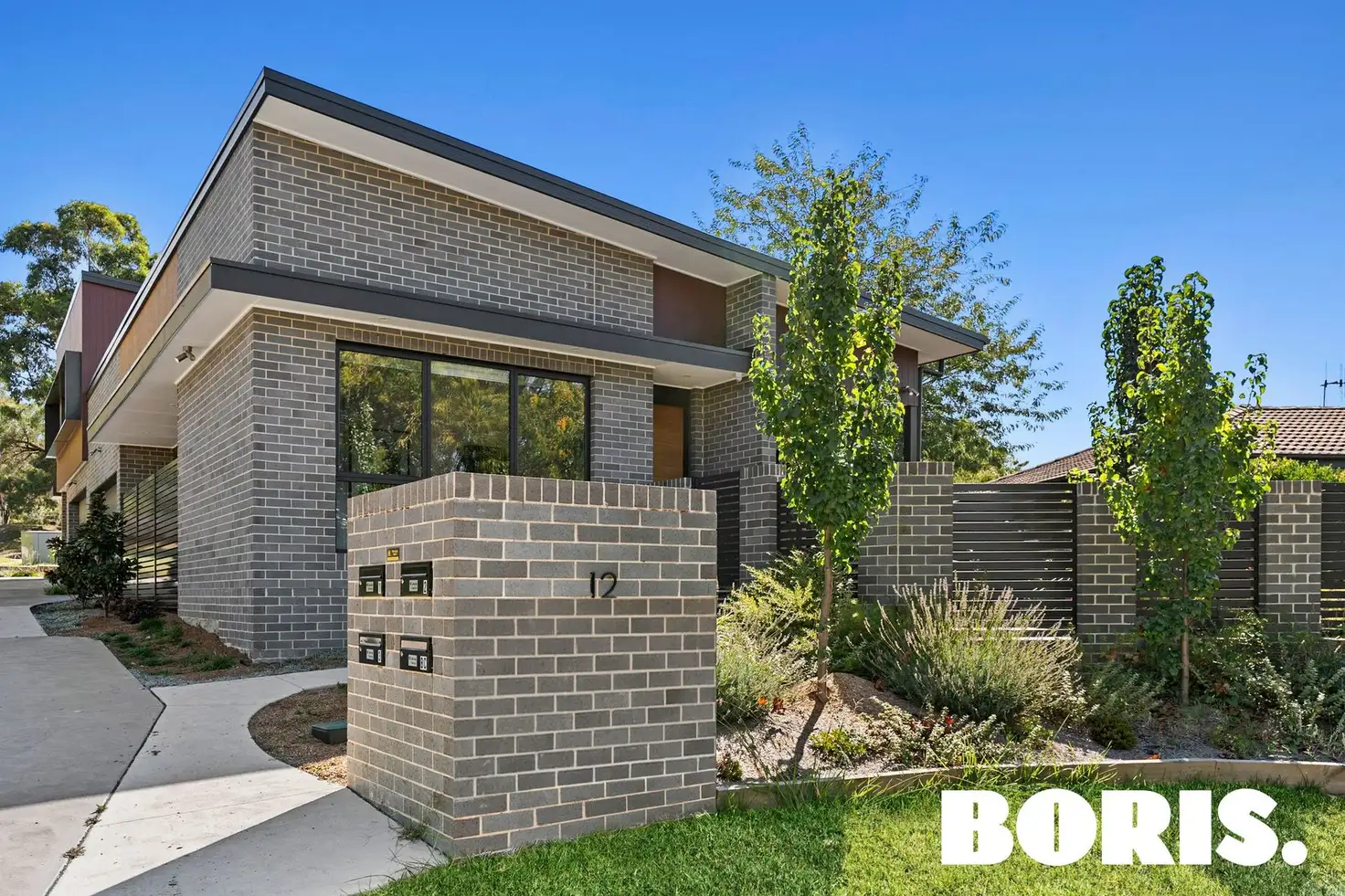 Main view of Homely townhouse listing, 1/12 Ligar Place, Holder ACT 2611