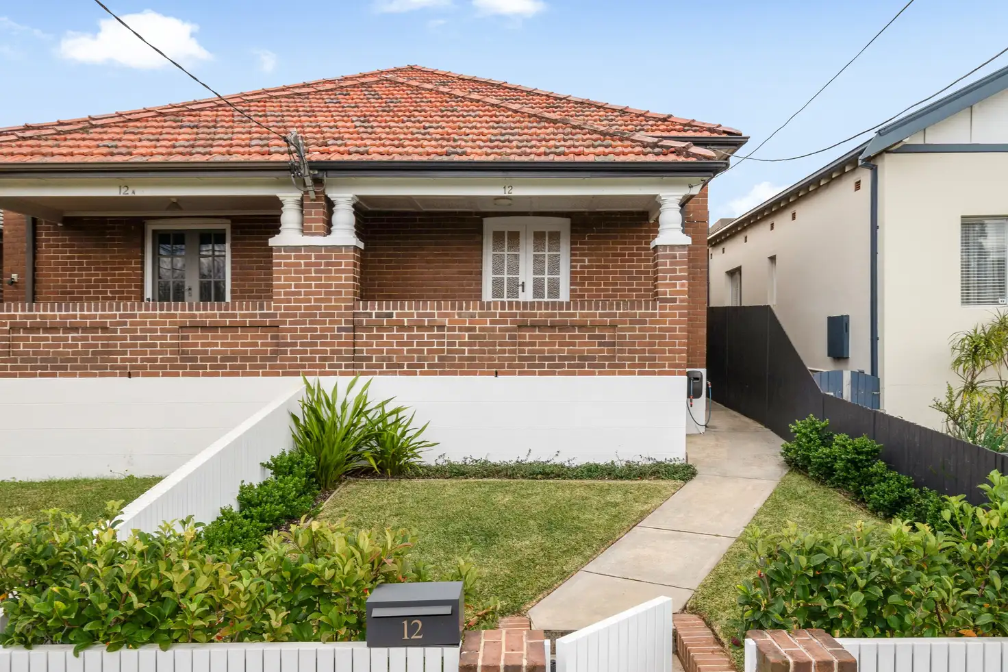 Main view of Homely semi-detached listing, 12 Seabrook Avenue, Russell Lea NSW 2046