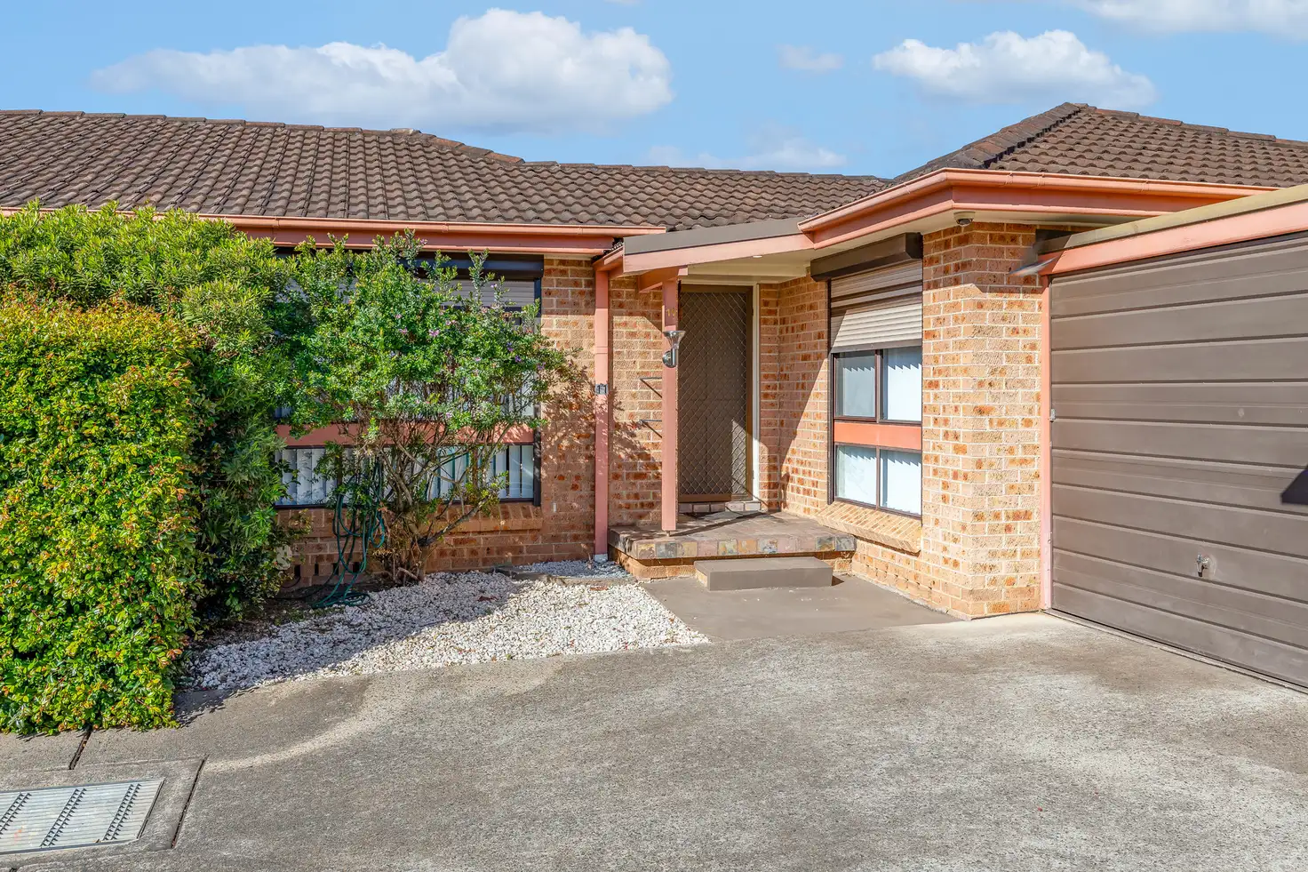 Main view of Homely villa listing, 11/65 Fuchsia Crescent, Macquarie Fields NSW 2564