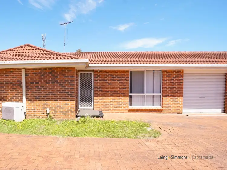Main view of Homely villa listing, 1/45-47 Budgerigar Street, Green Valley NSW 2168