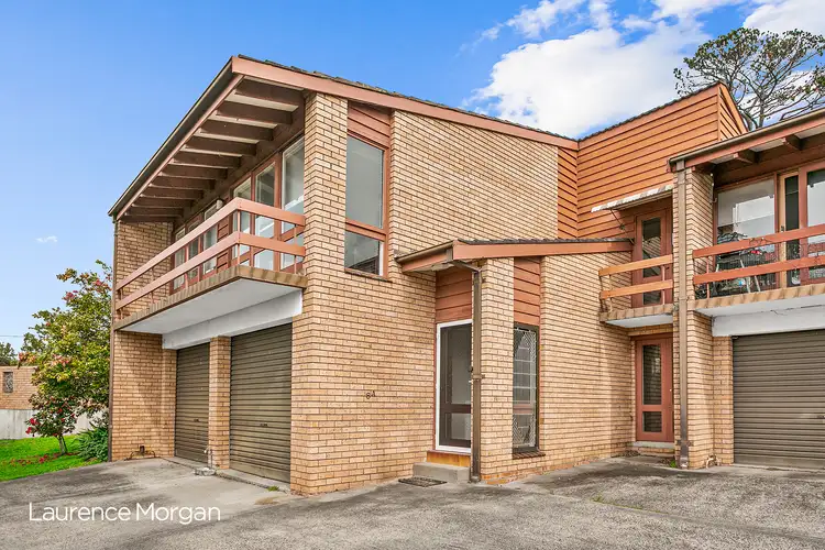 Main view of Homely townhouse listing, 1/8a Northwood Road, Mount Ousley NSW 2519