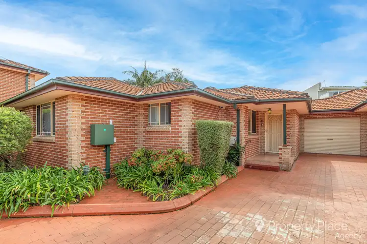 Main view of Homely villa listing, 2/23 Parkview Avenue, Picnic Point NSW 2213