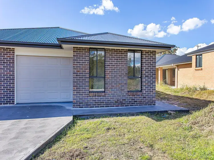 Main view of Homely semi-detached listing, 2/4 Kokoda Road, Morisset NSW 2264