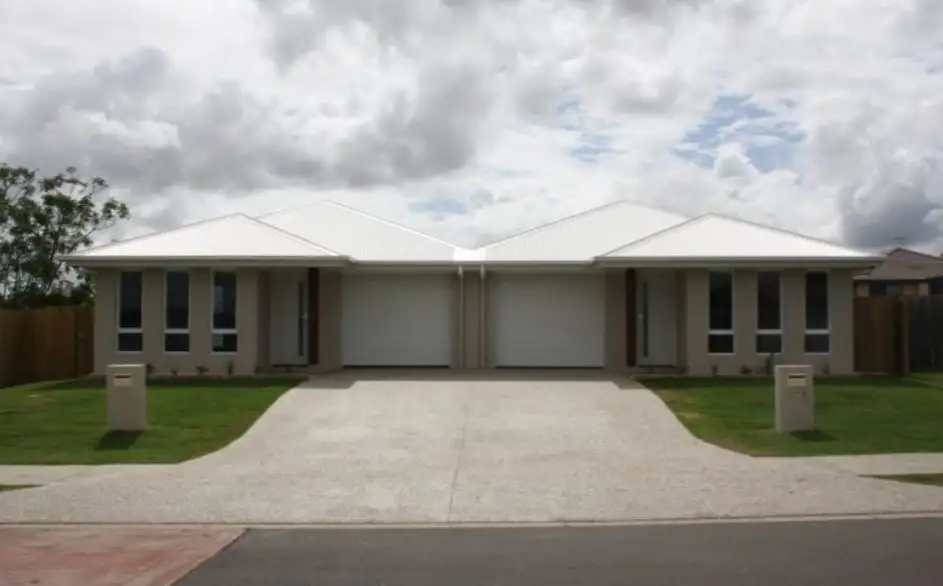 Main view of Homely semi-detached listing, 1/18 Banksia Drive, Raceview QLD 4305