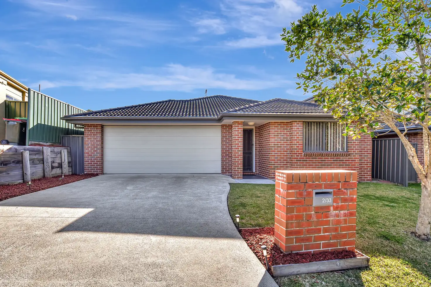 Main view of Homely villa listing, 2/33 Churnwood Drive, Fletcher NSW 2287