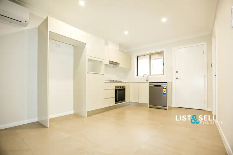 Main view of Homely house listing, 23A Wattle Avenue, Macquarie Fields NSW 2564