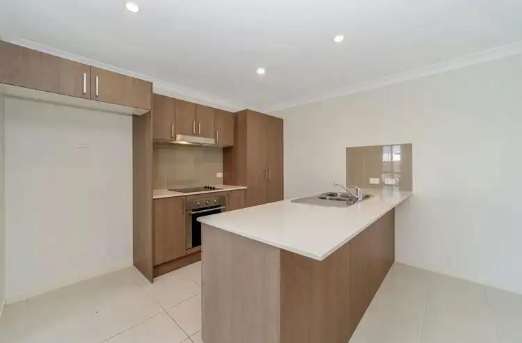Third view of Homely semi-detached listing, 1/49 Marblewood Circuit, Mount Low QLD 4818