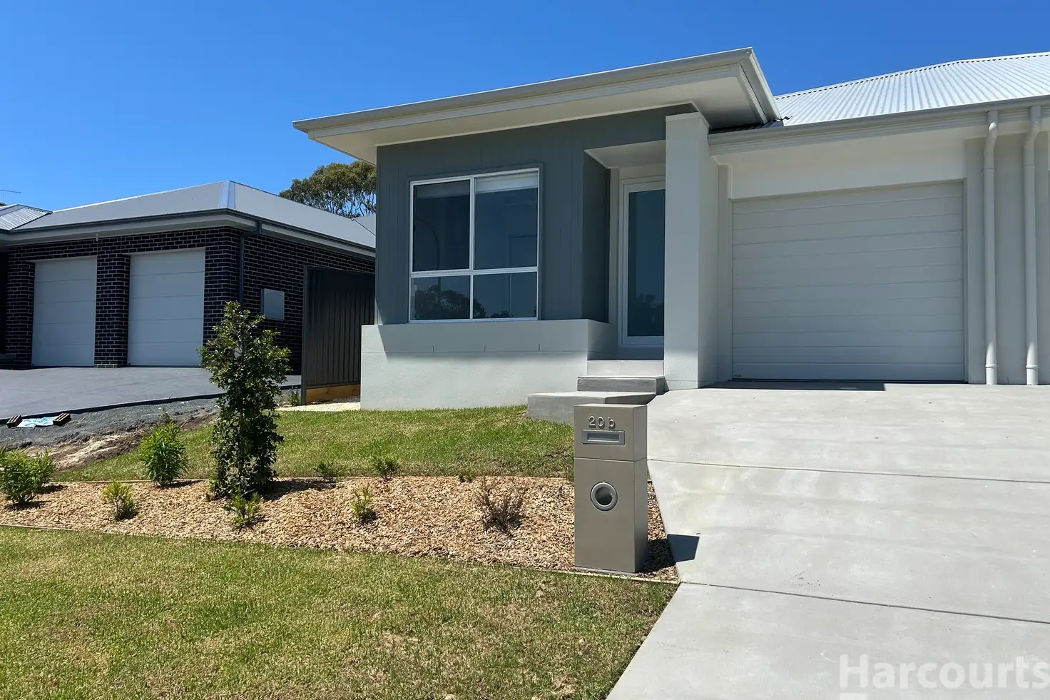Main view of Homely semi-detached listing, 20B Tiger Quoll Drive, Lake Cathie NSW 2445