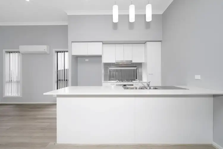 Second view of Homely townhouse listing, 1/24 Blantyre Road, Macquarie Hills NSW 2285