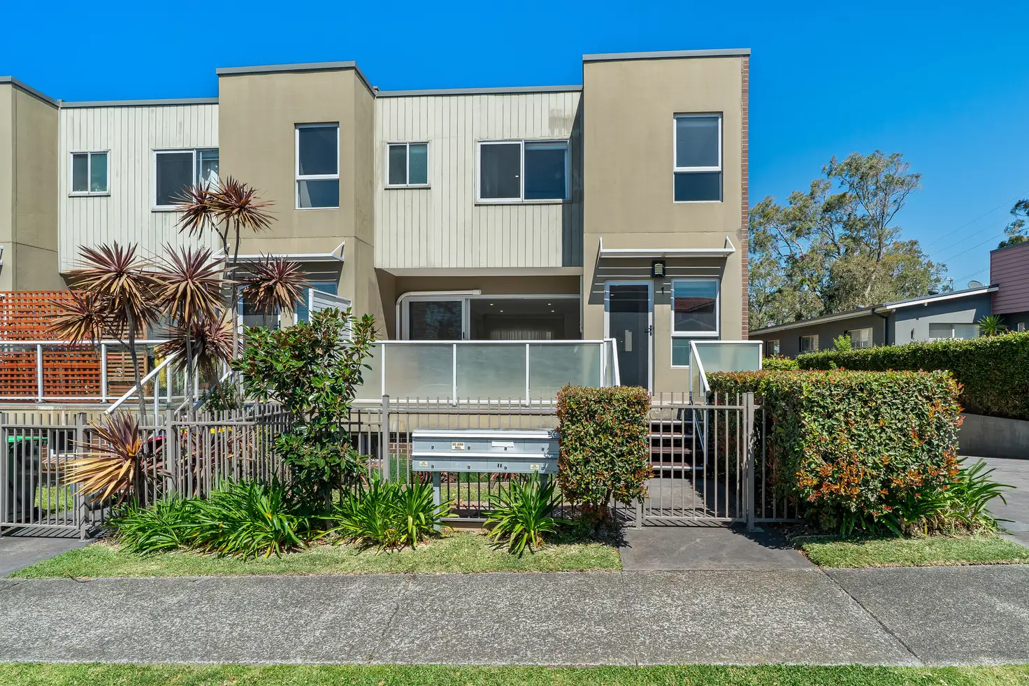 Main view of Homely townhouse listing, 1/261-263 Farmborough Road, Farmborough Heights NSW 2526