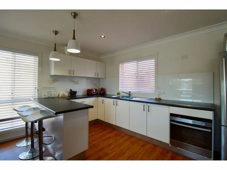 Main view of Homely townhouse listing, 1/219 Elizabeth Drive, Vincentia NSW 2540