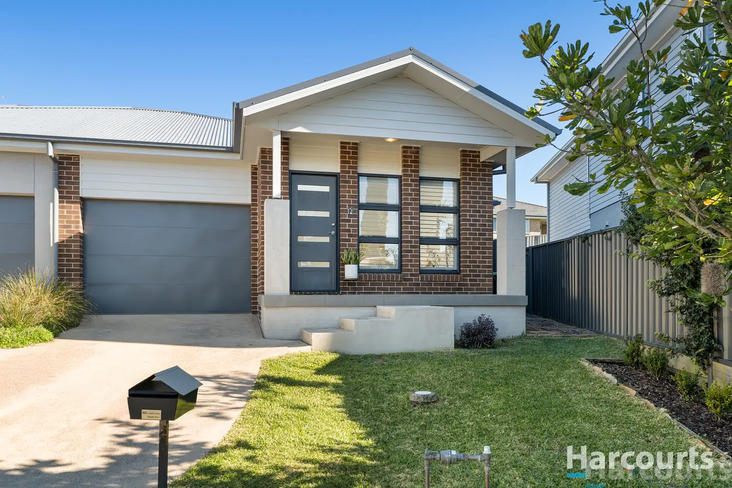 Main view of Homely semi-detached listing, 12 Kariba Close, Macquarie Hills NSW 2285