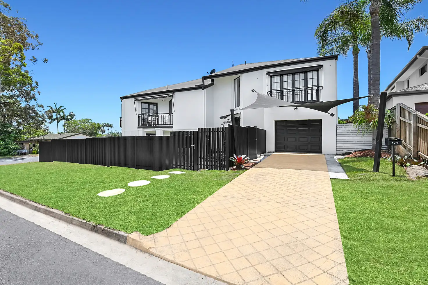 Main view of Homely townhouse listing, 1/7 Sandown Avenue, Bundall QLD 4217