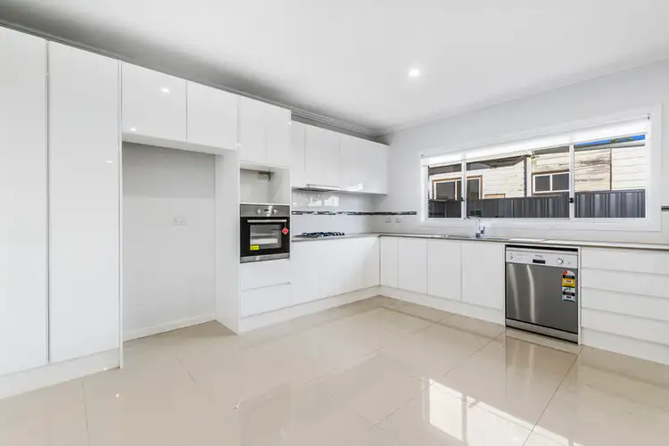 Main view of Homely townhouse listing, 2/104-106 Balgownie Road, Balgownie NSW 2519