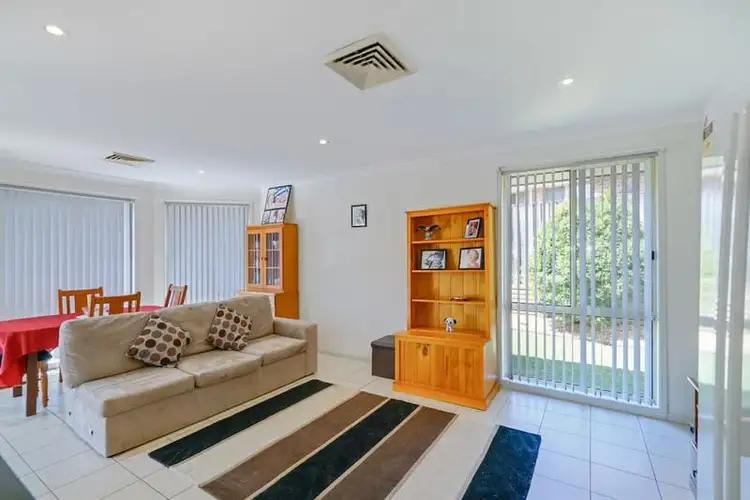 Third view of Homely house listing, 4 John Hunter Grove, Mount Annan NSW 2567