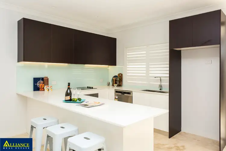 Main view of Homely townhouse listing, 1/5-7 Monie Avenue, East Hills NSW 2213