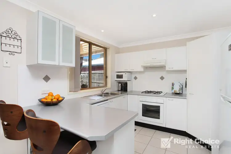 Third view of Homely semi-detached listing, 2/4 Burdekin Drive, Albion Park NSW 2527