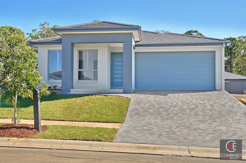Main view of Homely house listing, 12 Storksbill Avenue, Denham Court NSW 2565