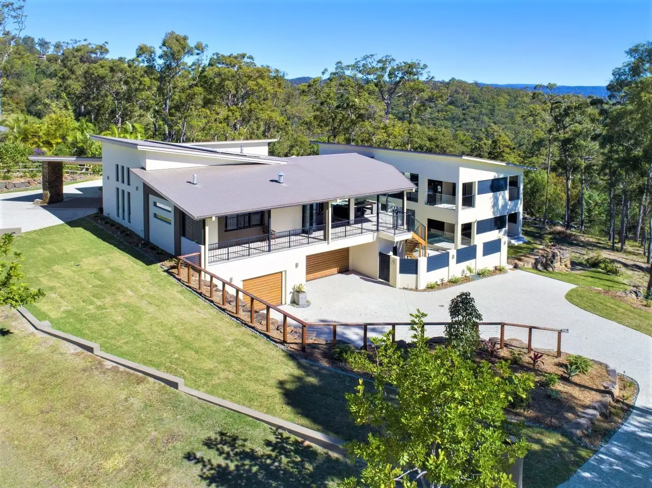 Main view of Homely house listing, 10-12 Forest Ridge Drive, Bonogin QLD 4213