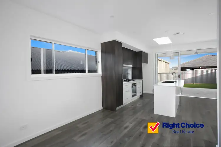 Third view of Homely semi-detached listing, 61A Saddleback Crescent, Kembla Grange NSW 2526