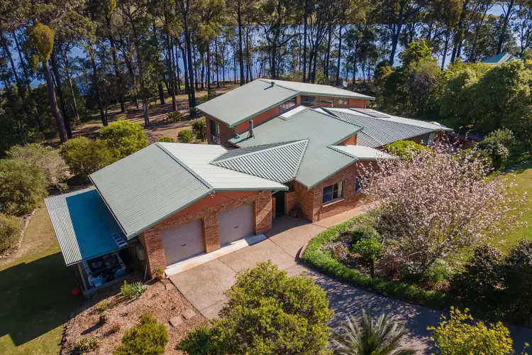 Main view of Homely house listing, 9 Endeavour Drive, Wallaga Lake NSW 2546