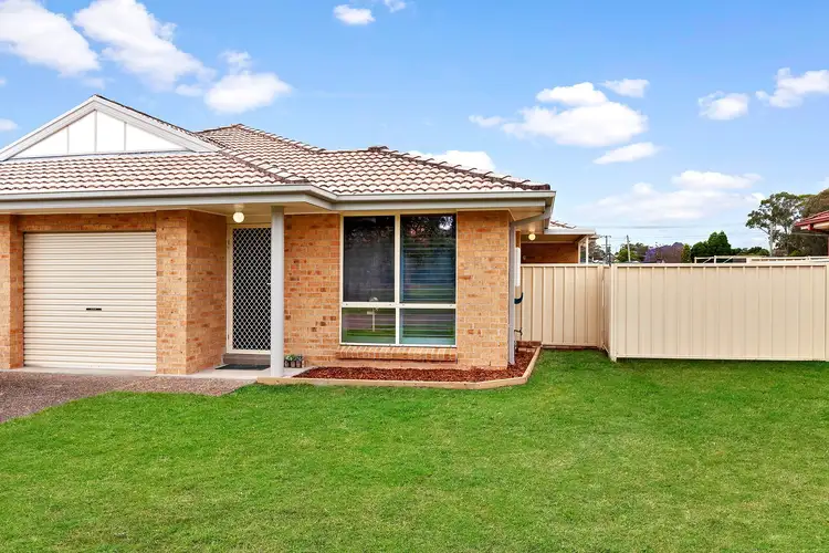 Main view of Homely semi-detached listing, 1/28 Grove Place, Cameron Park NSW 2285