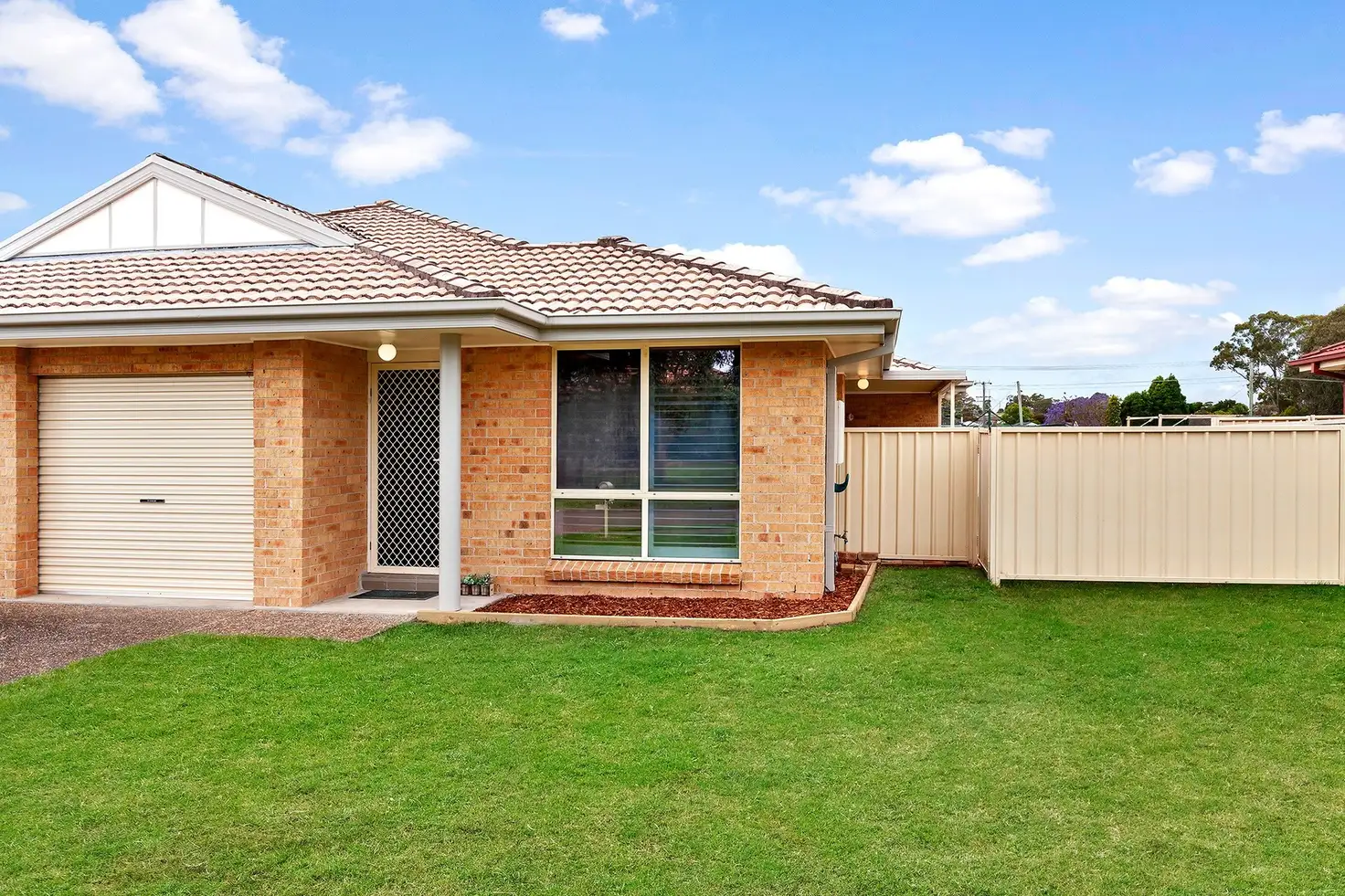 Main view of Homely semi-detached listing, 1/28 Grove Place, Cameron Park NSW 2285