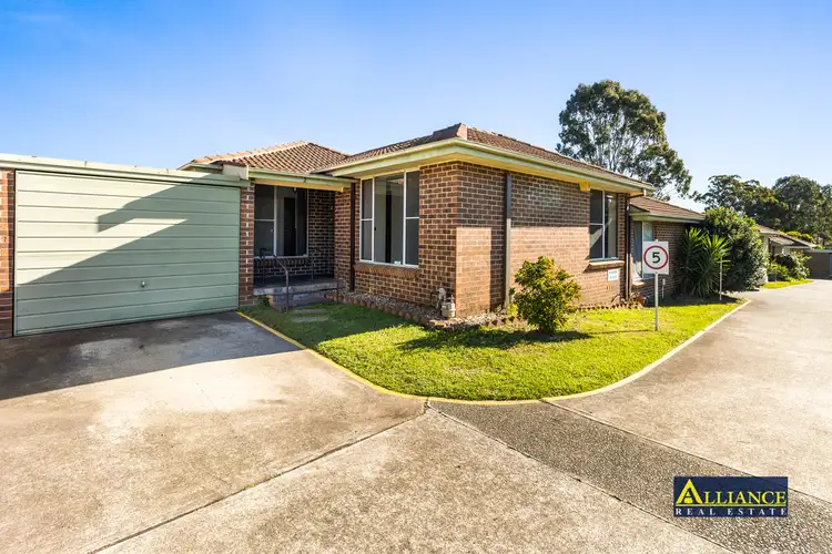 Main view of Homely villa listing, 2/12 Bensley Road, Macquarie Fields NSW 2564