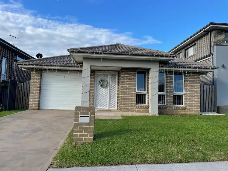 Main view of Homely house listing, 10 Bushpea Avenue, Denham Court NSW 2565