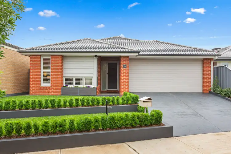 Main view of Homely house listing, 12 Lunar Way, Fraser Rise VIC 3336