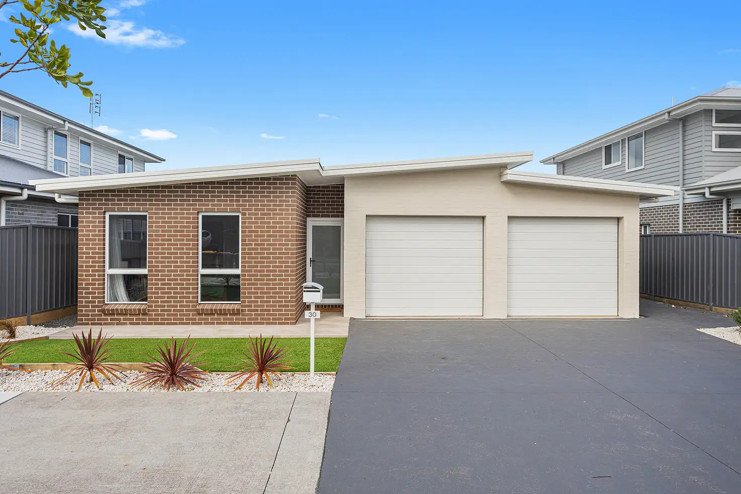 Main view of Homely semi-detached listing, 30 & 30a Stewards Drive, Kembla Grange NSW 2526
