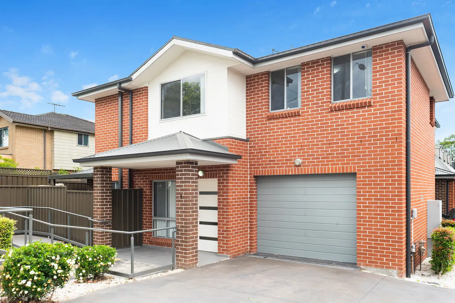 Main view of Homely townhouse listing, 1/199 Targo Road, Girraween NSW 2145