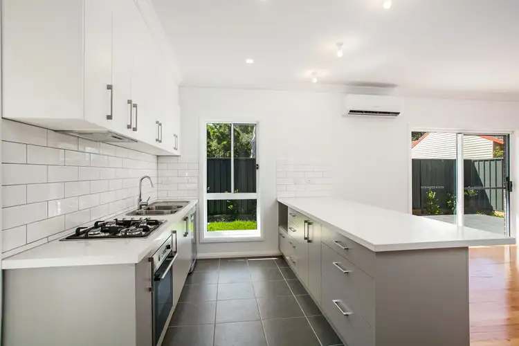 Main view of Homely villa listing, 2/4 Akuna Street, Keiraville NSW 2500