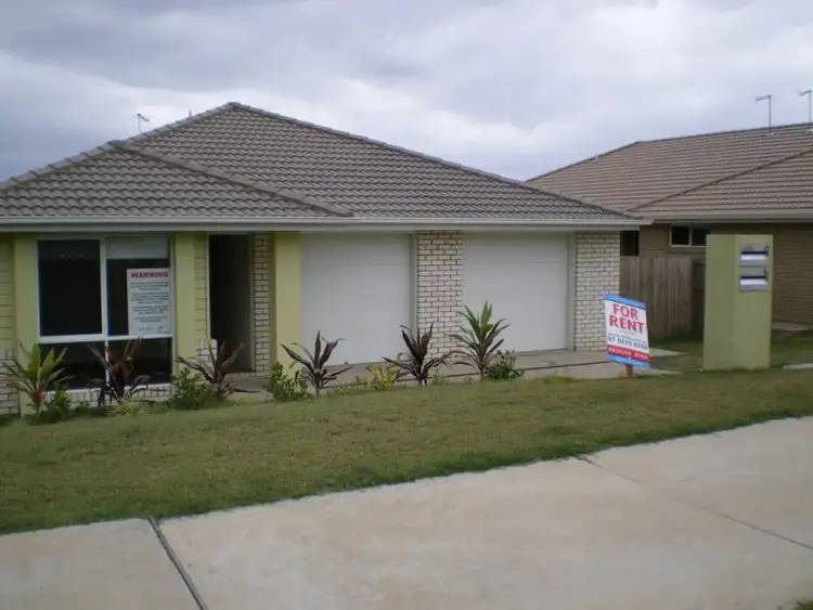Main view of Homely semi-detached listing, 1/65 Jane Street, Leichhardt QLD 4305