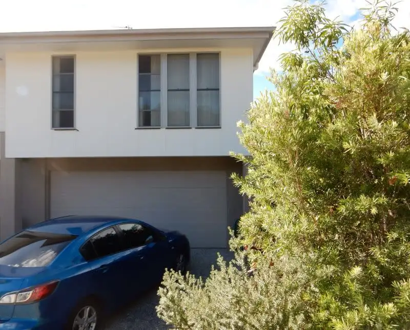 Main view of Homely semi-detached listing, 1&2/15 Bellinger Key, Pacific Pines QLD 4211