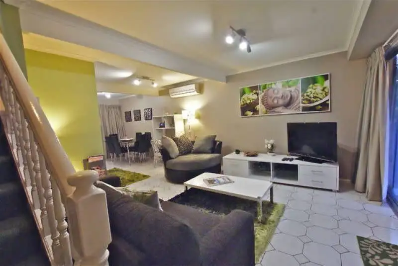 Main view of Homely townhouse listing, 1/2 Rainbow Drive, Mudgeeraba QLD 4213